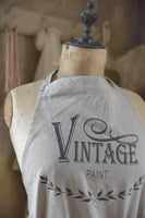 Förkläde med vintage paint logga